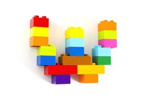Colorful toy brick letter W photo