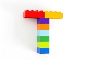 Colorful toy brick letter T photo