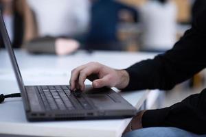 business people hands using laptop computer photo