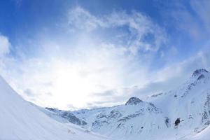 High mountains under snow in the winter photo