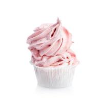 Pink tasty muffin isolated on white background. photo