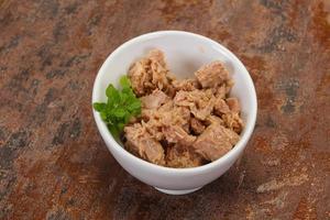 Canned tuna fish in the bowl photo