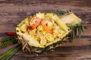 Fried rice with pineapple and prawns photo