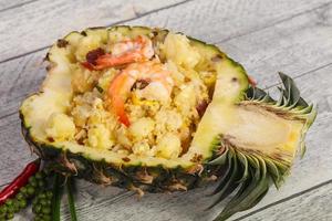 Fried rice with pineapple and prawns photo