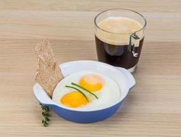 Breakfast with eggs and coffee photo