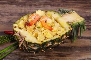 Fried rice with pineapple and prawns photo