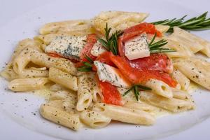 Penne with salmon photo