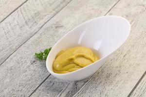 Mustard sauce in the bowl photo