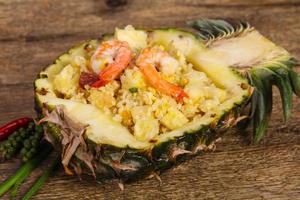 Fried rice with pineapple and prawns photo