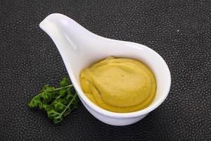 Mustard sauce in the bowl photo