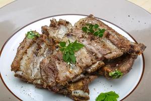 Roasted pork ribs photo