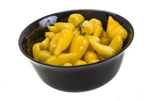 Yellow marinated hot pepper photo