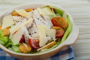 Caesar salad with chicken photo