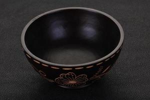 Empty wooden bowl photo