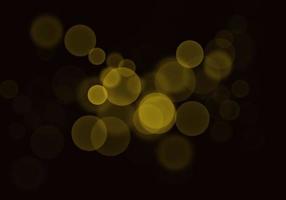 Golden yellow bokeh background  There is a sparkle of lights, Christmas and New Year party ideas. photo