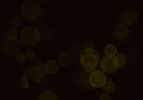 Golden yellow bokeh background  There is a sparkle of lights, Christmas and New Year party ideas. photo