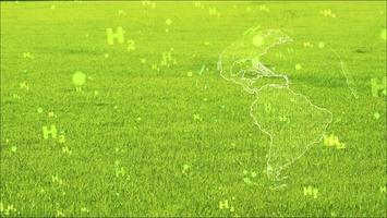 global digital and america continent with green H2 particles flying on green grass background photo