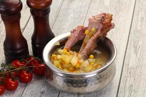 Peas soup with ribs photo