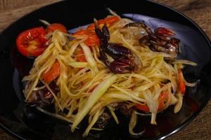 Green mango salad with seafood photo