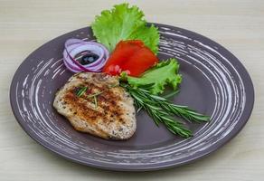 Grilled pork steak photo