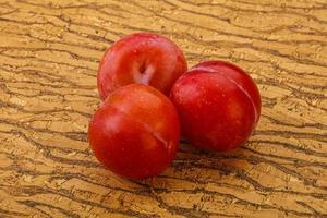 Ripe sweet tasty red plum photo