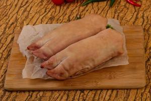 Raw pig's hoof photo