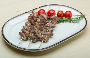 Grilled chicken hearts barbecue photo