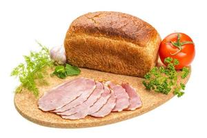 Ripe fresh ham with vegetables photo