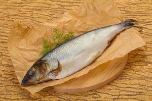 Salted herring over the wooden board photo