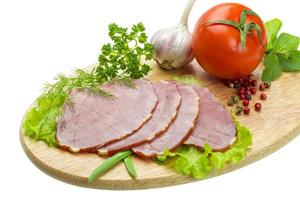 Ripe fresh ham with vegetables photo