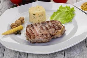 Grilled pork neck steak photo