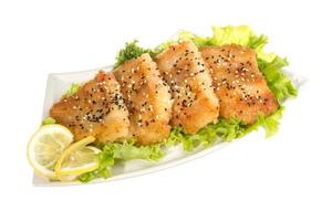 Roasted fish with lemon photo