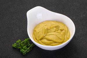 Mustard sauce in the bowl photo