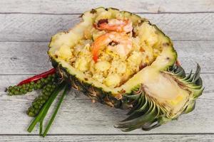 Fried rice with pineapple and prawns photo