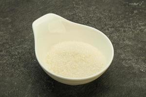 White sugar in the bowl photo