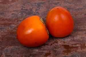 Sweet tasty persimmon photo