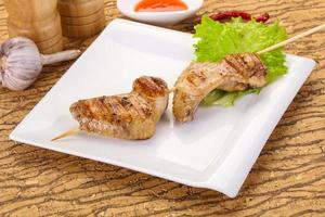 Chicken wings skewer photo