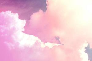 beauty sweet pink red colorful with fluffy clouds on sky. multi color rainbow image. abstract fantasy growing light photo