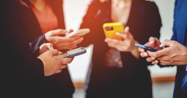 communication group of business people working as a team Use your smart phone . Global business and digital marketing internet connection application technology. Finance and Banking digital photo