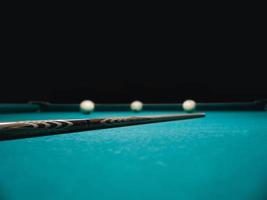 Billiard cue on the table of Russian billiard pyramid photo