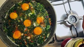 Pan fried spinach with egg