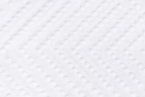 Background texture of paper towel with circles and lines close up. photo
