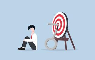 Wrong solution cause business failure, fail to achieve goal, disappointment from unsuccessful project concept. Businessman sadly sitting on floor after he could not unlock key on archery target.