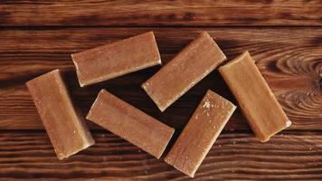 Laundry soap brown on a wooden background photo