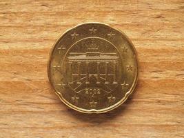 Moneda de 20 centavos que muestra la puerta de brandenburgo, moneda de alemania, ue foto