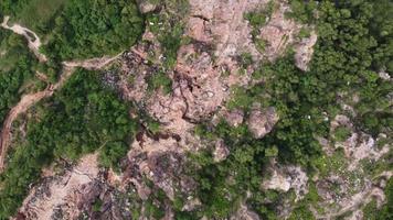 Aerial rotate and look down red clay soil video