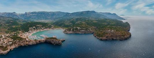 Aerial view of the luxury cliff house hotel on top of the cliff on the island of Mallorca. photo