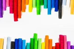 colorful plasticine sticks  clay on Isolated  background photo