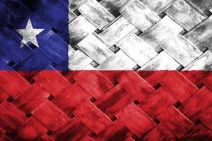 chile flag screen on wicker wood background photo