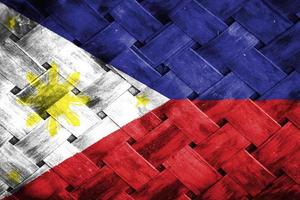 phillippines flag screen on wicker wood background photo